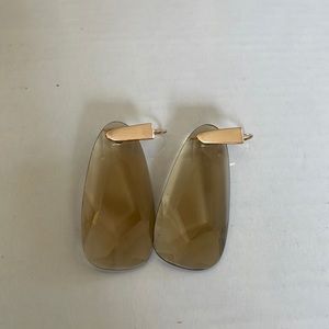 Kendra Scott rose gold metal with a topaz stone